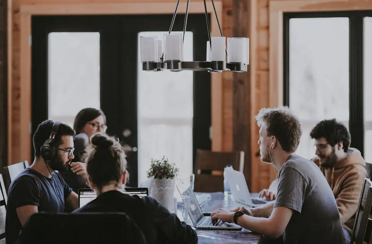 Hiring team discussing candidates in a conference room